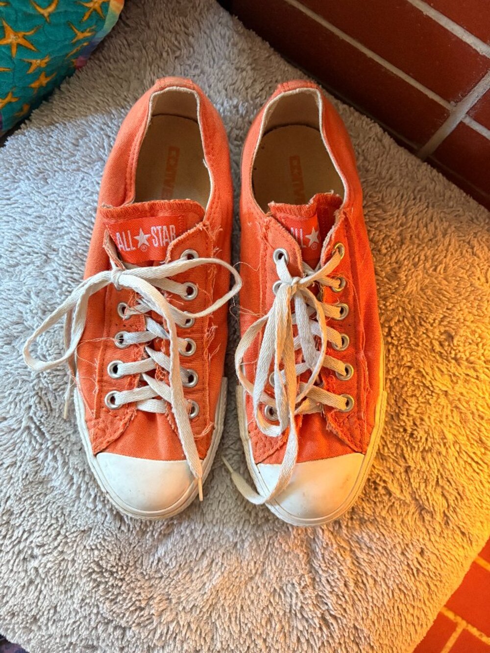 Orange low top Converse women size 8